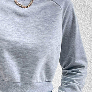 Perfee Raglan Sleeve Round Neck Cropped Sweatshirt