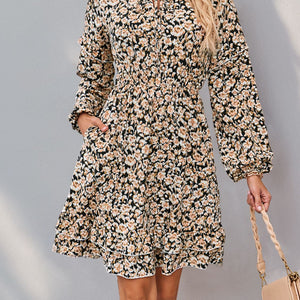 Perfee Printed Tie Neck Long Sleeve Mini Dress