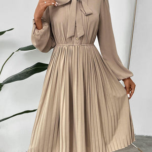 Perfee Pleated Tie Neck Long Sleeve Dress