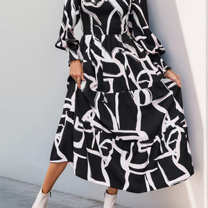 Perfee Smocked Printed Long Sleeve Midi Dress