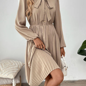 Perfee Pleated Tie Neck Long Sleeve Dress