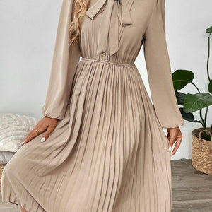 Perfee Pleated Tie Neck Long Sleeve Dress