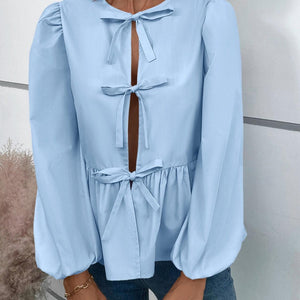 Ivy Lane Peplum Tied Long Sleeve Blouse